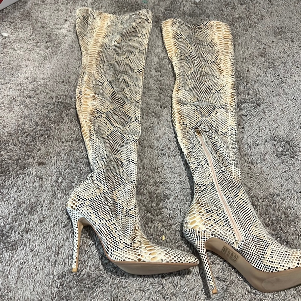 Knee high snake skin boots